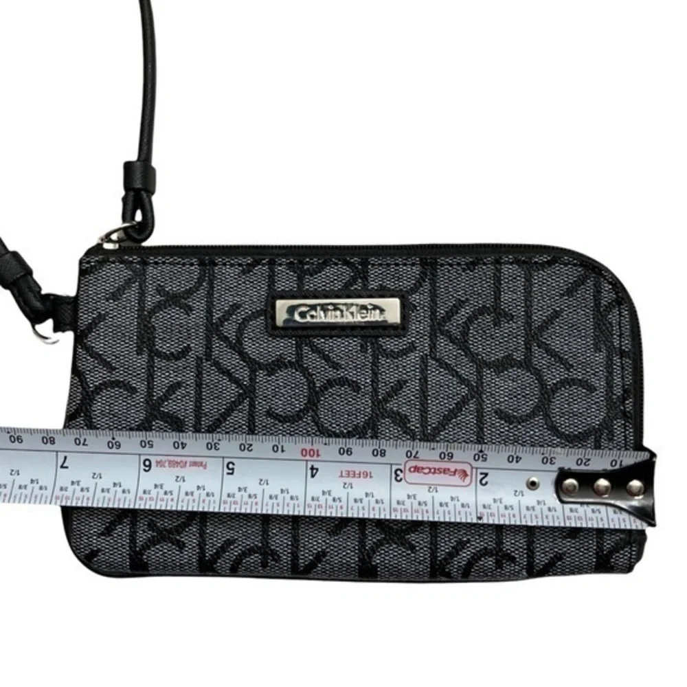 Calvin Klein gray black signature ck wristlet bag